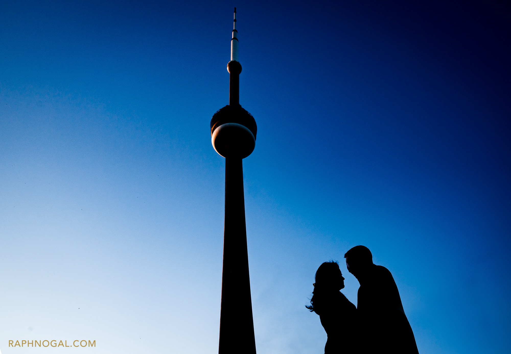 cn tower with couple's silhouette