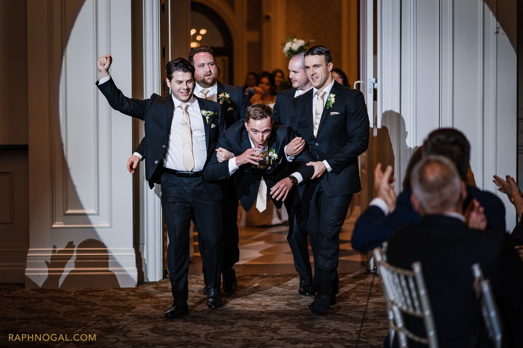 Groomsmen comedic reception entrance at Hazelton Manor